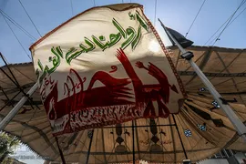 پرچم عزا بر فراز حسینیه کربلایی‌های تهران