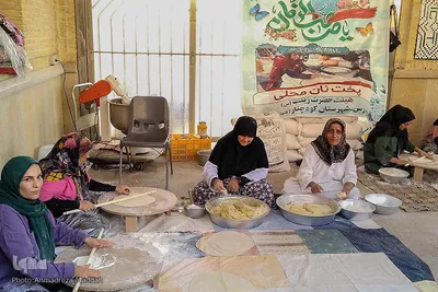 پخت نان سنتی صلواتی در حرم شاهچراغ(ع)‎‎