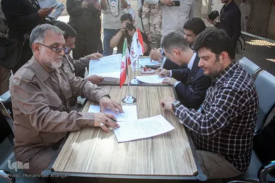 مراسم استقبال از پیکرهای 44 شهید تازه تفحص شده دوران دفاع مقدس در مرز بین المللی شلمچه برگزار شد