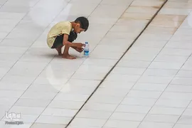 برکت باران در ماه مبارک رمضان در حرم حضرت علی(ع)