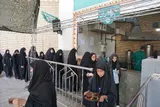 عکس | پذیرایی جانبازان از عزاداران تاسوعای حسینی در حرم بانوی کرامت