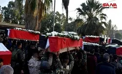 حمص میں شامی فوج پر داعش حملے کے شہداء کی تدفین + تصاویر