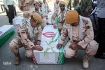 مراسم استقبال از پیکرهای 44 شهید تازه تفحص شده دوران دفاع مقدس در مرز بین المللی شلمچه برگزار شد