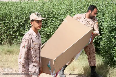 تشییع پیکرهای پاک و مطهر دو شهید گمنام دوران دفاع مقدس در مجتمع فرهنگی ورزشی فجر سپاه اهواز
