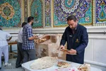پخت نان صلواتی در صحن حرم مطهر شاهچراغ (ع)