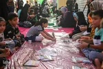 آماده‌سازی لباس همایش جهانی شیرخوارگان حسینی