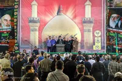 آیین نصب پرچم شب اول محرم در امامزاده عبدالله(ع) شوشتر