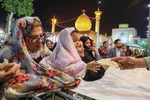 پخت نان صلواتی در صحن حرم مطهر شاهچراغ (ع)