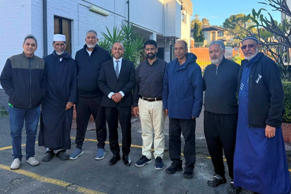 Australia Open Mosque Day Aimed at Promoting Dialogue, Community Harmony Community harmony day: Councillor Ash Rahman, fourth from left, with members of the Minto Mosque community.