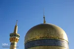 تعویض پرچم گنبد حرم امام رضا(ع)
