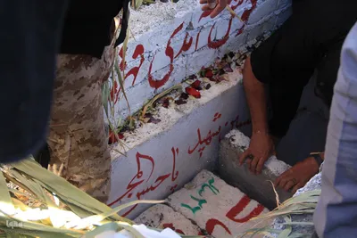 مراسم‌ خاکسپاری شهید گمنام دربوستان الهیه بیرجند