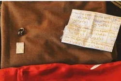 Şəhid Süleymanini Ayətullah Xameneinin əbası ilə kəfən etdilər