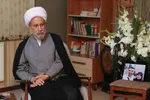 حضور آیت‌الله دژکام در منزل شهید معصومه کرباسی‎