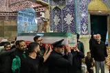 طواف پیکر شهید قمی بر گرد ضریح مطهر حضرت فاطمه معصومه (س)