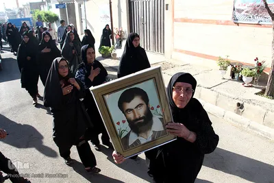 مراسم تشییع یک شهید گمنام در روستای نهاوند 