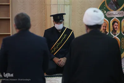 تعویض پرچم گنبد حرم رضوی در آغاز ماه محرم