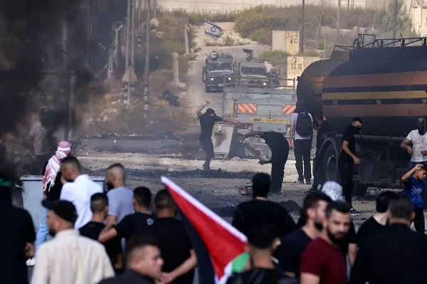 Israeli Settlers, Forces Kill 11 Palestinians in West Bank amid Gaza War