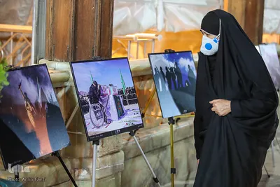 برپایی نمایشگاه عکس به مناسبت هفته دفاع مقدس در حرم مطهر شاهچراغ(ع)