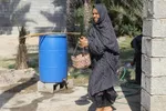 پخت «حلیم در جُم ( خمره) میراثی ۳۰۰ ساله در فین