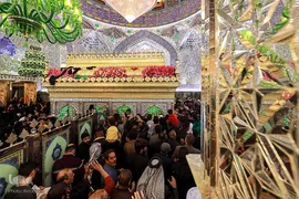 گل آرایی مضجع شریف حضرت علی(ع) در عید سعید مبعث