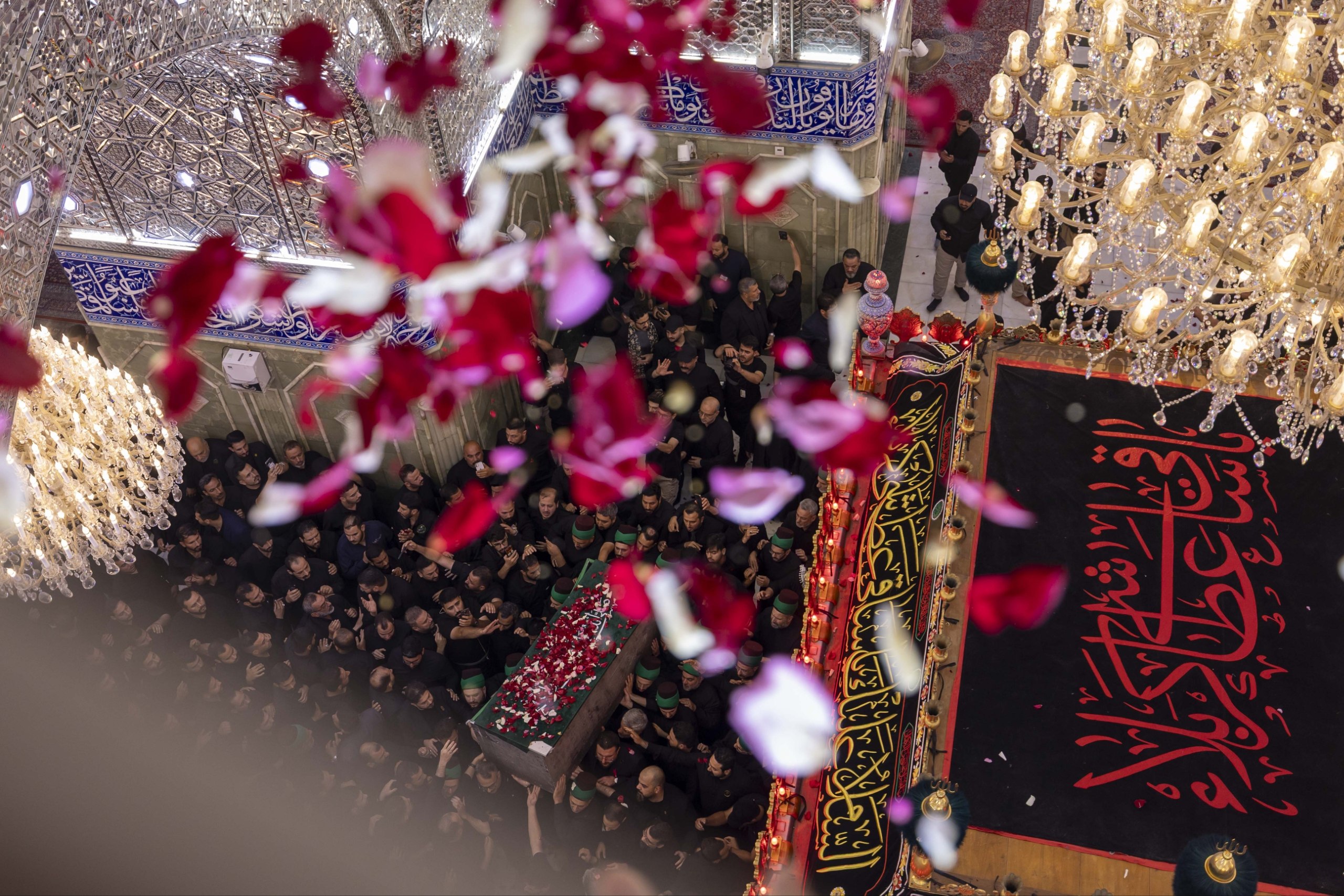 The coffin of the martyred Imam of the Islamic Ummah, Ayatollah Seyed Ali Khamenei was showered with flowers at the holy shrine of Hazrat Abbas (AS) in Karbala, Iraq, on Wednesday, July 8, 2026.