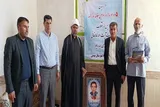دیدار امام جمعه بهمئی با خانواده شهدا