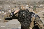 آیین «گل‌مالی» صبح عاشورا در فولادشهر اصفهان