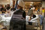 عیادت تولیت آستان حرم شاهچراغ(ع) از مجروحان حادثه تروریسی این حرم مطهر
