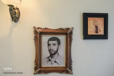 دیدار جامعه قرآنی با خانواده‌ شهید محمدصالحی