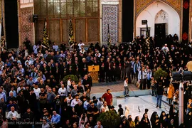 برافراشتن پرچم حرم امام حسین (ع) بر گنبد کربلای ایران