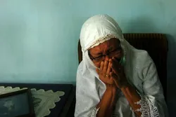 Indonesians Pray, Await News of Relatives on Missing Plane