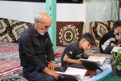 برگزاری کرسی تلاوت قرآن همزمان با ایام شهادت اباعبدالله‌الحسین(ع)‎ در ملایر