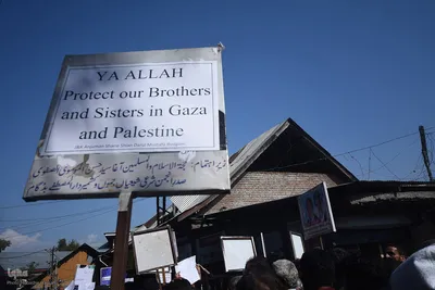 Kashmiri Muslims hold placards as they chant slogans against Israel and the U.S. during a protest against Israel's military operations in Gaza, on October 13, 2023, in Budgam, west of Srinagar, Indian-administered Kashmir, India. (Photo by Mubashir Hassan, IQNA)