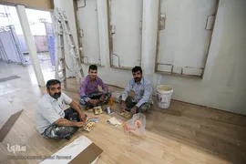 آماده سازی غرفه ایکنا در بیست و سومین نمایشگاه مطبوعات