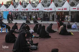 نمایشگاه «عطر سیب» در میدان آئینی امام حسین(ع)