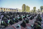 اهتزاز پرچم عزا بر فراز گنبد فيروزه‌اي آستان شاهچراغ(ع)
