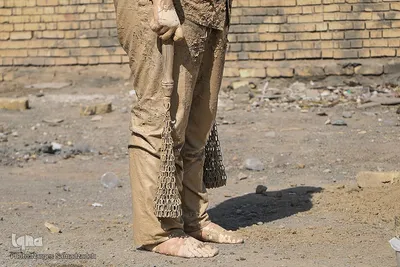 آیین «گل‌مالی» صبح عاشورا در فولادشهر اصفهان