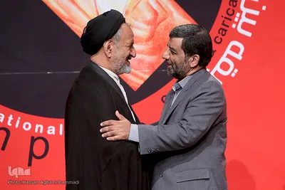 سیدعزت‌الله ضرغامی، عضو شورای عالی انقلاب فرهنگی و حجت الاسلام دعایی، مدیر مسئول روزنامه اطلاعات