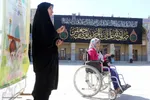 آیین سیاه‌پوشان و تعویض پرچم گنبد حرم حضرت شاهچراغ‌(ع)