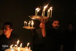 آیین شمع گردانی شب عاشورا در روستای بهدان⁩