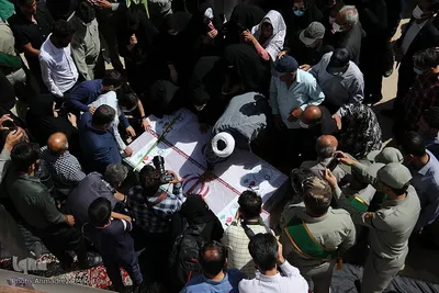 آیین وداع با پیکرهای محیط‌بان شهید محمد فرهمند و همیار محیط زیست شهید رضا بهرام‌پور از شهدای مظلوم محیط زیست فارس در حرم مطهر حضرت شاهچراغ (ع)
