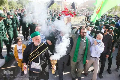 تشییع پیکرهای پاک و مطهر دو شهید گمنام دوران دفاع مقدس در مجتمع فرهنگی ورزشی فجر سپاه اهواز