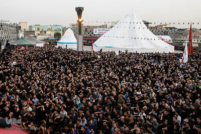 مراسم خیمه سوزان عصر عاشورا در میدان امام حسین (ع) تهران
