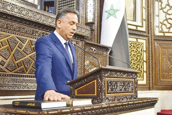 عضو بمجلس الشعب السوري يقسم على القرآن والإنجيل معاً
