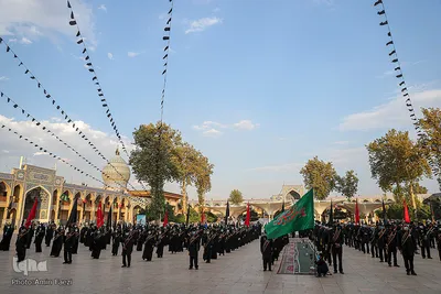 مراسم تعویض پرچم گنبد حرم حضرت شاهچراغ (ع)