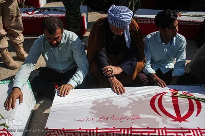 مراسم استقبال از پیکرهای 44 شهید تازه تفحص شده دوران دفاع مقدس در مرز بین المللی شلمچه برگزار شد