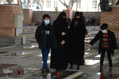 آئین غبار روبی و عطر افشانی مزار شهدا