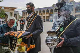 آیین تعویض پرچم گنبد آستان حضرت شاهچراغ (ع)‎‎