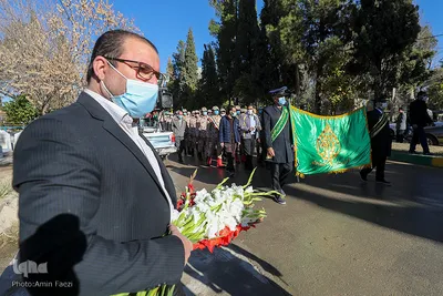 غبارروبی و عطرافشانی گلزار شهدای گمنام شیراز