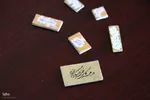 خوشنویسی که هنرش با ذره‌بین دیده می‌شود‎